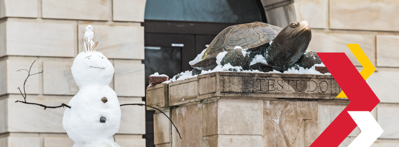 Testudo statue at McKeldin Mall with a snowman