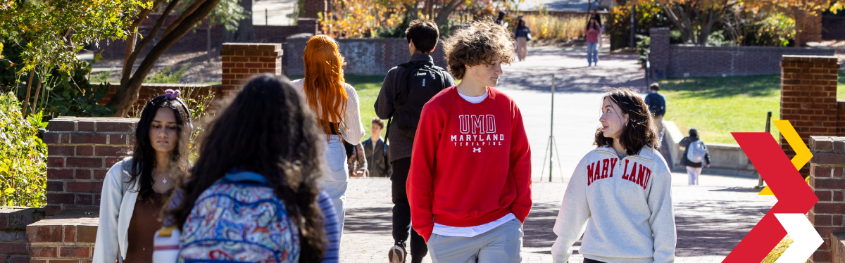 students walking on campus in the fall